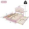 A diagram of a pink bed with dimensions indicated by lines and numbers. Náhled obrázku produktu
