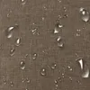 A close-up view of a brown fabric surface with water droplets on it. Produktbild-Vorschau