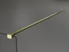 A close-up view of a shower screen support bar, angled diagonally against a gray background. Produktbild-Vorschau