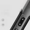 A close-up view of a power tool's handle with buttons. Voir les images du produit
