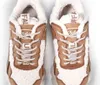 A top-down view of a pair of beige and brown Buffalo CLD Chai Warm sneakers with white fluffy lining. Podgląd zdjęcia produktu