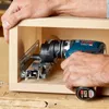 A person is using a cordless drill to attach a drawer slide to a wooden cabinet. Náhled obrázku produktu
