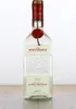 A bottle of Schladerer Kirschwasser on a wooden surface against a white background. Produktbild-Vorschau