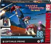 The image shows the packaging for a Transformers Studio Series Optimus Prime toy, featuring artwork of the character and his truck mode. Anteprima dell’immagine prodotto