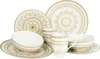 A collection of white and gold mandala-patterned dinnerware, including plates, bowls, and mugs, arranged on a white background. Náhľad obrázku produktu