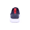 The back view of a blue sneaker with a white sole and a red accent on the heel tab. Produktbild-Vorschau
