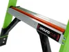 A close-up view of a section of a green ladder, showing the "GROUND CUE" branding on a silver metal plate with an orange bar. Podgląd zdjęcia produktu