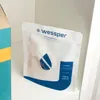 A product package for Wessper P3 Humifill is placed on a white shelf next to a colorful object. Podgląd zdjęcia produktu