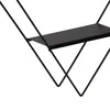 A close-up view of a black metal wall shelf with a diamond-shaped frame. Anteprima dell’immagine prodotto