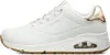 A side view of a white Skechers Uno sneaker with gold accents. Náhled obrázku produktu