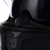A close-up view of the ventilation system and side detail of a black motorcycle helmet. Náhled obrázku produktu