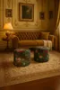 A living room scene with a sofa, ottomans, and a lamp. Produktbild-Vorschau