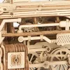 Close-up view of a wooden model train engine, showing intricate details of gears and mechanical parts. Podgląd zdjęcia produktu