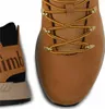 Close-up view of a brown Timberland boot, showing the lacing system and part of the heel. Produktbild-Vorschau