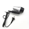 A compact GRUNDIG hair dryer with its power cord and plug, displayed against a white background. Anteprima dell’immagine prodotto
