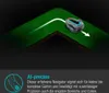 A robotic lawnmower navigating a grassy corner with a white path indicating its movement. Produktbild-Vorschau