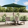 A patio scene with two lounge chairs under a green umbrella. Náhľad obrázku produktu