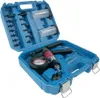 A blue plastic case containing a vacuum pump kit with various adapters and a pressure gauge. Produktbild-Vorschau