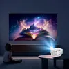 A child sits on the floor watching a projector display a fantasy scene from an open book. Produktbild-Vorschau