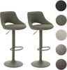 Two green bar stools are shown against a white background, with swatches of different available colors displayed on the right side. Podgląd zdjęcia produktu