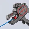 A close-up shot of a Knipex wire stripper tool with a blue wire inserted. Produktbild-Vorschau