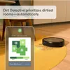 A robot vacuum cleaner is shown cleaning a floor, with a smartphone app interface displaying its cleaning progress. Náhled obrázku produktu