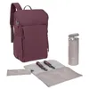 A deep red backpack with accessories laid out. Produktbild-Vorschau