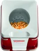 Draufsicht auf einen rot-weißen Unold Popcornmaker Classic, der in der runden Kammer mit ungepoppten Produktbild-Vorschau