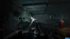 A dark, gritty, first-person perspective of a dimly lit, abandoned industrial-looking environment, possibly a tunnel or bunker, with debris and a strange, glowing entity in the center. Produktbild-Vorschau