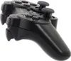 A black wireless gamepad is shown from a side angle against a white background. Voir les images du produit