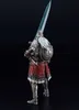 A full-body shot of an action figure of a knight holding a sword and shield, against a black background. Produktbild-Vorschau