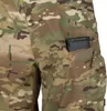 A close-up shot of camouflage pants with a rifle magazine in a pocket. Produktbild-Vorschau