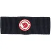 A dark blue knitted headband with a circular Fjällräven logo in the center. Produktbild-Vorschau