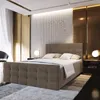 A bedroom scene featuring a bed, nightstands, and lamps. Produktbild-Vorschau