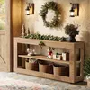 A console table decorated for Christmas in a hallway. Produktbild-Vorschau
