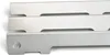Three metal grill heat shields are stacked on top of each other, with the bottom one featuring a flame-shaped cutout. Voir les images du produit