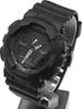 A black G-Shock watch is displayed on a stand against a white background. Podgląd zdjęcia produktu