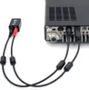 The back of a radio transceiver with cables connected to a digital modem. Produktbild-Vorschau