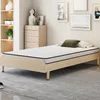 A bedroom scene with a single bed, dresser, and bookshelf. Podgląd zdjęcia produktu