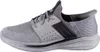 A side view of a gray Skechers shoe against a white background. Voir les images du produit