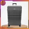 A suitcase is displayed on a wooden platform with a gradient background. Náhled obrázku produktu