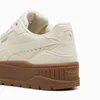 Close-up view of the heel and sole of a beige Puma sneaker. Produktbild-Vorschau