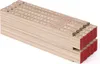 A stack of folded wooden rulers with red ends against a white background. Produktbild-Vorschau
