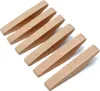 Six wooden wedges arranged diagonally on a white background. Produktbild-Vorschau