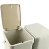 Two plastic trash cans are shown against a white background. One is open, revealing its interior, while the other is closed. Produktbild-Vorschau