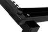 A close-up view of the corner of a black metal server rack, showing a bolt and a rubber foot. Produktbild-Vorschau