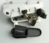 The back of a car headlight assembly is shown with wires and connectors exposed, next to a small black bag with the 'Wessper' logo on it, placed in a black tray. Produktbild-Vorschau