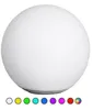 A white spherical LED lamp with a row of colored circles below it. Produktbild-Vorschau