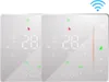 Two white smart thermostats are displayed side-by-side against a white background. Each thermostat has a digital display showing the temperature and time, along with various icons. Produktbild-Vorschau