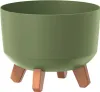 A green planter pot with three brown legs. Náhled obrázku produktu